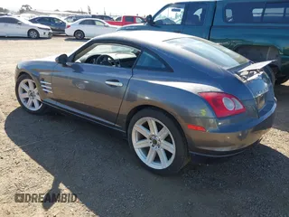 2004 Chrysler Crossfire z VIN 1C3AN69L14X007112, wystawiony jako IAAI lot #40656585 z przebiegiem 99 674 mil mil oraz . Historia ofert i sprzedaży dostępna na DreamBid. Obrazek 3.