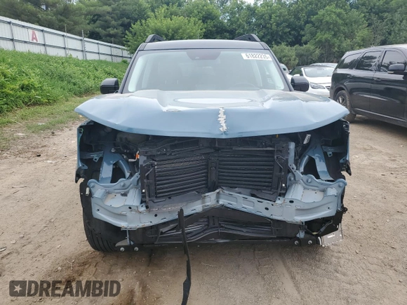 2022 Ford Bronco Sport Outer Banks z VIN 3FMCR9C61NRD00690, wystawiony jako Copart lot #61822235 z przebiegiem 10 635 mil mil oraz Czysty tytuł • Clean title. Historia ofert i sprzedaży dostępna na DreamBid. Obrazek 5.