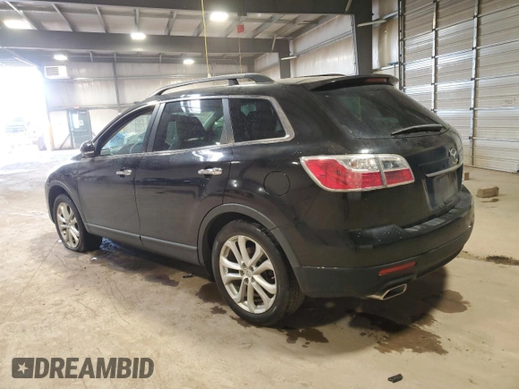 2012 Mazda CX-9 Grand Touring с VIN JM3TB3DV0C0365983, выставлен на аукционе Copart как лот 48670515 с пробегом 108 543 миль миль и Списание • Salvage title. История ставок и продаж доступна на DreamBid. Изображение 2.
