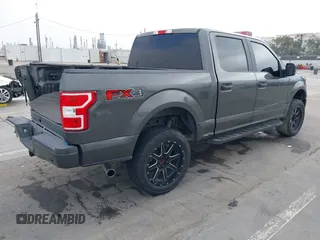 2018 Ford F-150 XL with VIN 1FTEW1EP4JKD45070, listed as a IAAI auction lot 42648874 with 140,424 mi miles and . Bid and sale history available at DreamBid. Image 4.
