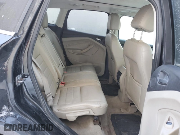 2013 Ford Escape SEL z VIN 1FMCU9H96DUD30275, wystawiony jako Copart lot #88585435 z przebiegiem 317 668 mil mil oraz Czysty tytuł • Clean title. Historia ofert i sprzedaży dostępna na DreamBid. Obrazek 11.