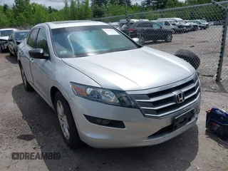 2010 Honda Crosstour EX-L z VIN 5J6TF1H58AL015518, wystawiony jako IAAI lot #42267818 z przebiegiem 153 726 mil mil oraz . Historia ofert i sprzedaży dostępna na DreamBid. Obrazek 1.