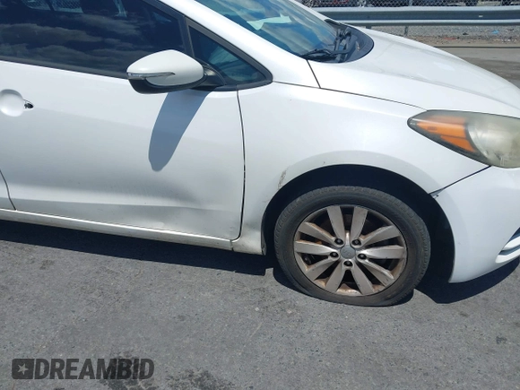 2014 Kia Forte LX with VIN KNAFX4A61E5055158, listed as a IAAI auction lot 42212501 with 224,830 mi miles and . Bid and sale history available at carsss.com. Image 12.