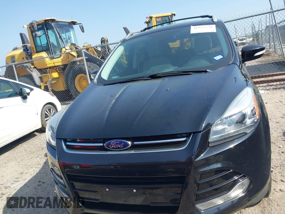 2016 Ford Escape Titanium with VIN 1FMCU0JX5GUC88013, listed as a IAAI auction lot 41933751 with 77,789 mi miles. Bid and sale history available at carsss.com. Image 12.
