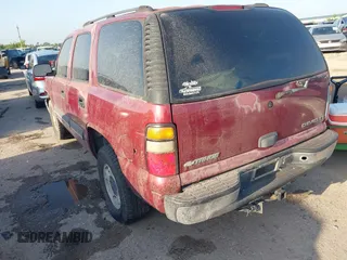 2004 Chevrolet Tahoe LS z VIN 1GNEC13VX4J112970, wystawiony jako IAAI lot #42380764 z przebiegiem 294 201 mil mil oraz . Historia ofert i sprzedaży dostępna na DreamBid. Obrazek 3.