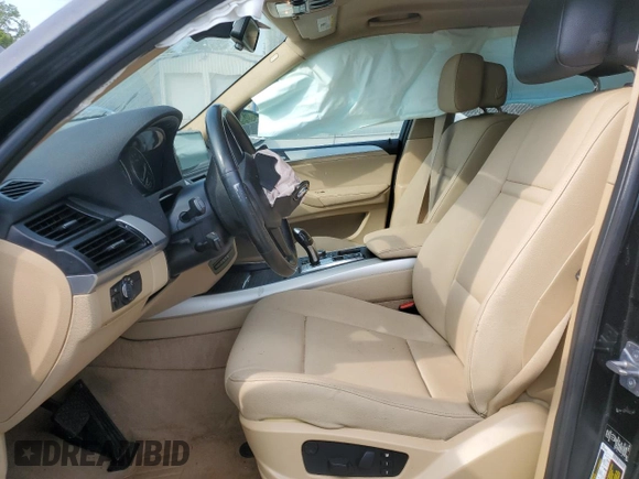 2012 BMW X5 35i with VIN 5UXZV4C5XCL761370, listed as a Copart auction lot 59436845 with 124,722 mi miles and Salvage title. Bid and sale history available at DreamBid. Image 7.