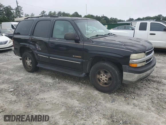 2001 Chevrolet Tahoe LS z VIN 1GNEC13T51J268893, wystawiony jako Copart lot #58527885 z przebiegiem 285 422 mil mil oraz Szkoda całkowita • Salvage title. Historia ofert i sprzedaży dostępna na DreamBid. Obrazek 4.