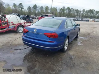 2017 Volkswagen Passat 1.8T SE w/Technology with VIN 1VWGT7A32HC003089, listed as a IAAI auction lot 41933870 with 118,863 mi miles. Bid and sale history available at carsss.com. Image 4.