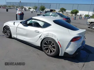 2021 Toyota Supra 2.0 with VIN WZ1DB2C01MW039946, listed as a IAAI auction lot 42519516 with 21,073 mi miles and . Bid and sale history available at DreamBid. Image 3.