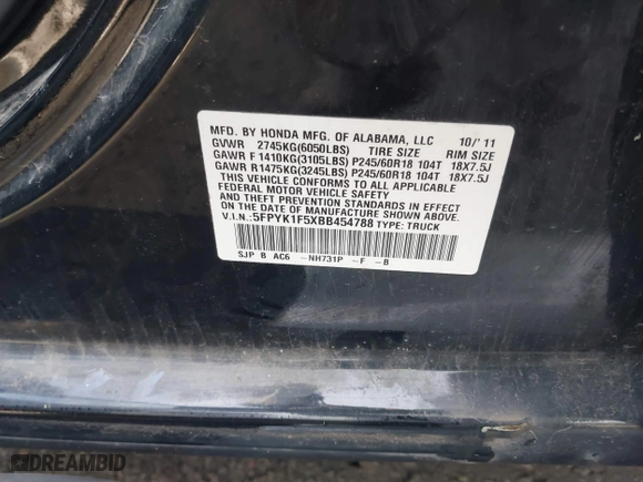 2011 Honda Ridgeline RTL with VIN 5FPYK1F5XBB454788, listed as a IAAI auction lot 41501881 with 171,481 mi miles. Bid and sale history available at carsss.com. Image 9.