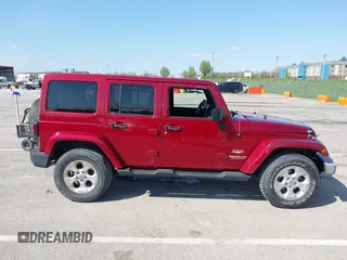 2013 Jeep Wrangler Unlimited Sahara с VIN 1C4BJWEG5DL569977, выставлен на аукционе IAAI как лот 41980394 с пробегом 145 571 миль миль и . История ставок и продаж доступна на DreamBid. Изображение 13.