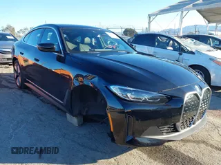 2023 BMW i4 eDrive35 z VIN WBY43AW00PFP73031, wystawiony jako IAAI lot #41309858 z przebiegiem 11 467 mil mil oraz . Historia ofert i sprzedaży dostępna na DreamBid. Obrazek 1.