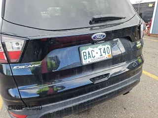2018 Ford Escape SE z VIN 1FMCU9GDXJUA69802, wystawiony jako IAAI lot #42413413 z przebiegiem 92 564 mil mil oraz . Historia ofert i sprzedaży dostępna na DreamBid. Obrazek 22.