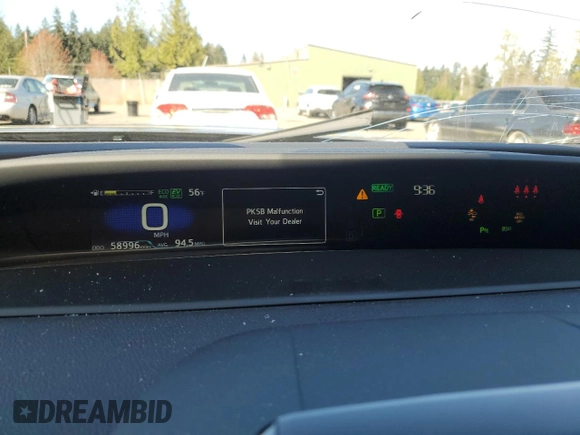 2021 Toyota Prius LE with VIN JTDKAMFP7M3185847, listed as a Copart auction lot 52897465 with 58,996 mi miles and Salvage Title. Bid and sale history available at DreamBid. Image 9.