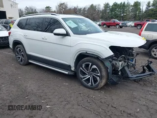 2021 Volkswagen Atlas SEL Premium z VIN 1V2TR2CA8MC574397, wystawiony jako IAAI lot #41961544 z przebiegiem 89 732 mil mil oraz . Historia ofert i sprzedaży dostępna na DreamBid. Obrazek 1.