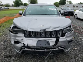 2020 Jeep Grand Cherokee Altitude with VIN 1C4RJFAGXLC360611, listed as a Copart auction lot 55687915 with 19,708 mi miles and Salvage title. Bid and sale history available at DreamBid. Image 5.
