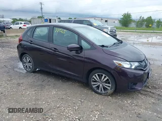 2015 Honda Fit EX-L z VIN 3HGGK5H84FM734308, wystawiony jako IAAI lot #42572565 z przebiegiem 130 513 mil mil oraz . Historia ofert i sprzedaży dostępna na DreamBid. Obrazek 1.