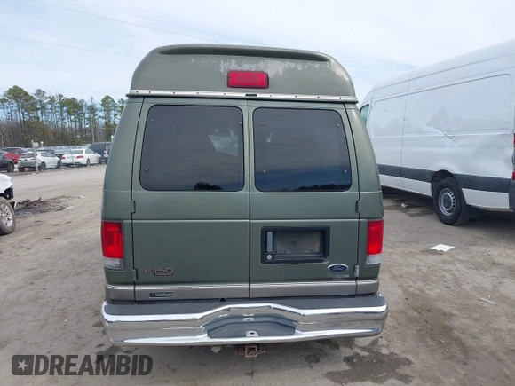 2002 Ford Econoline Passenger XL with VIN 1FMRE11L82HA83636, listed as a IAAI auction lot 41718025 with 153,581 mi miles and . Bid and sale history available at DreamBid. Image 16.