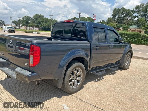 2020 Nissan Frontier SV with VIN 1N6ED0EA7LN711453, listed as a Copart auction lot 64101035 with 149,918 mi miles and Clean title. Bid and sale history available at DreamBid. Image 4.