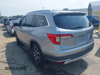 2019 Honda Pilot Elite with VIN 5FNYF6H08KB025449, listed as a IAAI auction lot 42450139 with 98,368 mi miles and . Bid and sale history available at DreamBid. Image 3.