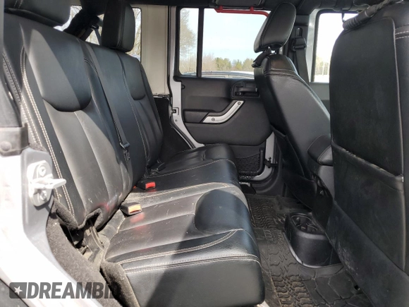 2015 Jeep Wrangler Unlimited Rubicon Hard Rock with VIN 1C4HJWFG4FL575054, listed as a Copart auction lot 51672655 with 130,405 mi miles and Clean title. Bid and sale history available at DreamBid. Image 11.