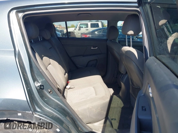 2015 Kia Sportage LX with VIN KNDPB3ACXF7696918, listed as a IAAI auction lot 42179023 with 64,181 mi miles and . Bid and sale history available at DreamBid. Image 8.