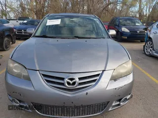2005 Mazda 3 s with VIN JM1BK323551245843, listed as a IAAI auction lot 41860274 with 166,579 mi miles. Bid and sale history available at carsss.com. Image 6.