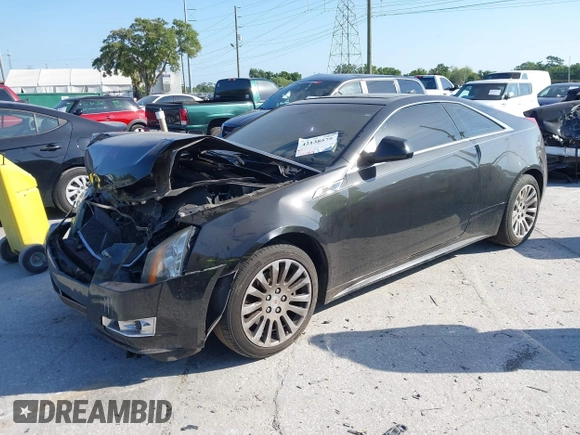 2012 Cadillac CTS Premium z VIN 1G6DP1E3XC0116593, wystawiony jako IAAI lot #42138575 z przebiegiem 198 884 mil mil oraz . Historia ofert i sprzedaży dostępna na DreamBid. Obrazek 2.