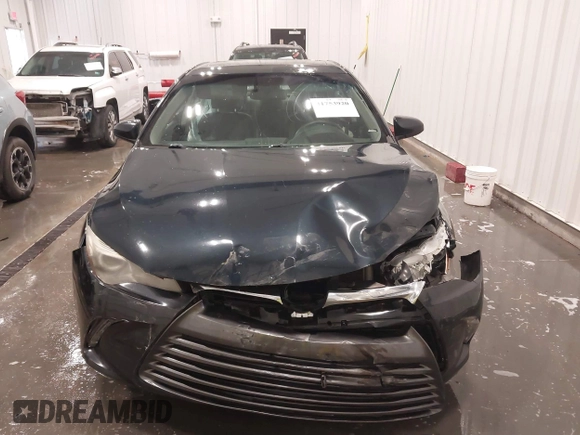 2015 Toyota Camry XLE with VIN 4T1BF1FK7FU906861, listed as a IAAI auction lot 41753920 with 92,389 mi miles and . Bid and sale history available at DreamBid. Image 12.