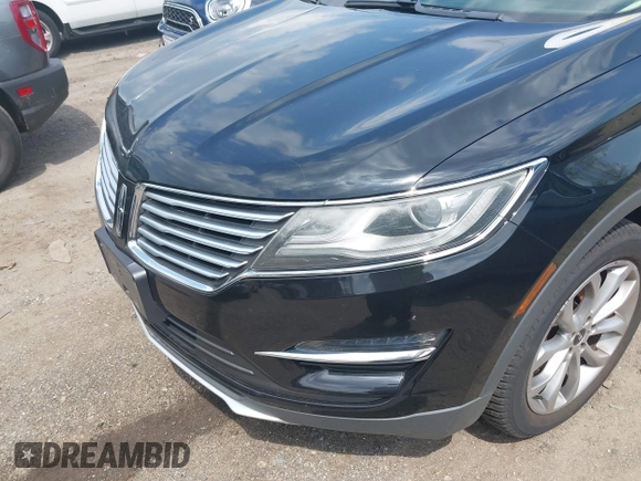2016 Lincoln MKC Select with VIN 5LMCJ2D97GUJ26611, listed as a IAAI auction lot 42462595 with Not provided miles and . Bid and sale history available at DreamBid. Image 6.