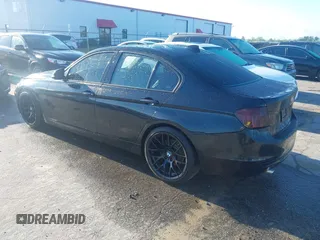 2013 BMW 3 Series 328i with VIN WBA3C1C50DF435473, listed as a IAAI auction lot 41981570 with 135,227 mi miles. Bid and sale history available at carsss.com. Image 3.
