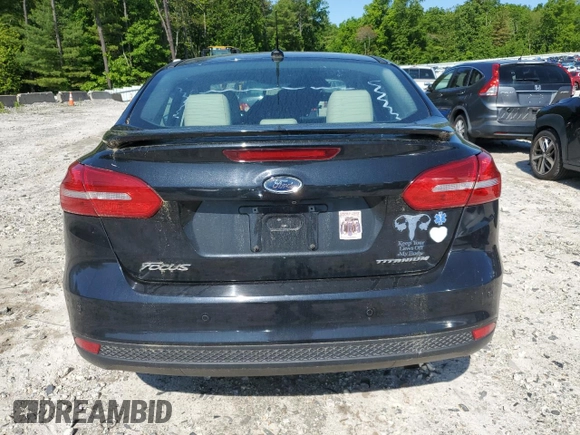 2015 Ford Focus Titanium with VIN 1FADP3J2XFL200489, listed as a Copart auction lot 56443215 with 139,990 mi miles and Clean title. Bid and sale history available at DreamBid. Image 6.