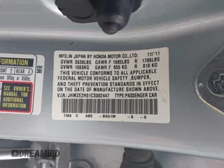 2012 Honda Insight LX with VIN JHMZE2H51CS002447, listed as a IAAI auction lot 42353583 with 179,377 mi miles and . Bid and sale history available at DreamBid. Image 9.