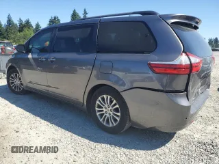 2015 Toyota Sienna XLE with VIN 5TDYK3DC7FS630252, listed as a Copart auction lot 65182965 with 90,764 mi miles and Salvage title. Bid and sale history available at DreamBid. Image 2.