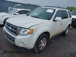2012 Ford Escape Limited with VIN 1FMCU0EG2CKB95451, listed as a IAAI auction lot 42103270 with 292,213 mi miles. Bid and sale history available at carsss.com. Image 2.
