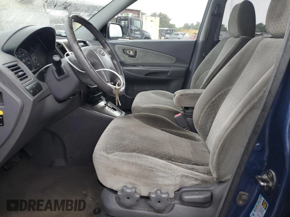2005 Hyundai Tucson GLS with VIN KM8JN12D05U074879, listed as a Copart auction lot 73746674 with 0 mi miles and Salvage Title. Bid and sale history available at carsss.com. Image 7.