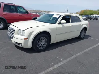 2009 Chrysler 300 Touring with VIN 2C3KA53V39H632191, listed as a IAAI auction lot 41936327 with 148,646 mi miles. Bid and sale history available at carsss.com. Image 2.