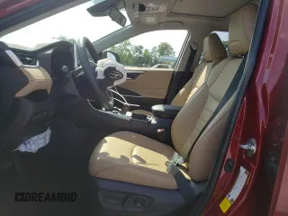 2023 Toyota RAV4 Hybrid XLE Premium with VIN JTMB6RFV2PD541262, listed as a Copart auction lot 60106845 with 32,447 mi miles and Salvage title. Bid and sale history available at DreamBid. Image 7.