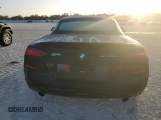 2020 BMW Z4 sDrive30i with VIN WBAHF3C03LWW64905, listed as a Copart auction lot 77010554 with 27,612 mi miles and Salvage Title. Bid and sale history available at carsss.com. Image 6.