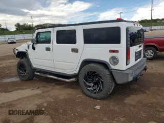 2004 Hummer H2 z VIN 5GRGN23U94H109105, wystawiony jako Copart lot #60548255 z przebiegiem 218 770 mil mil oraz Czysty tytuł • Clean title. Historia ofert i sprzedaży dostępna na DreamBid. Obrazek 2.