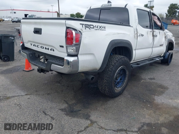 2023 Toyota Tacoma 4WD SR with VIN 3TMCZ5AN0PM550641, listed as a IAAI auction lot 41929355 with 18,917 mi miles. Bid and sale history available at carsss.com. Image 4.