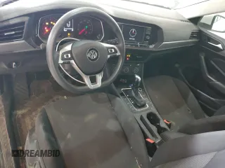 2021 Volkswagen Jetta S z VIN 3VWC57BU4MM014328, wystawiony jako Copart lot #53358745 z przebiegiem 88 307 mil mil oraz Czysty tytuł • Clean title. Historia ofert i sprzedaży dostępna na DreamBid. Obrazek 8.