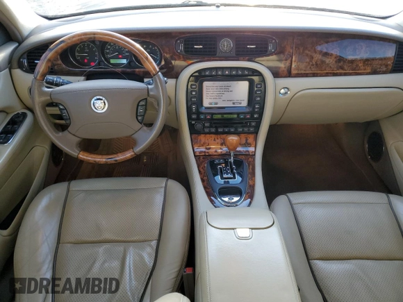 2009 Jaguar XJ with VIN SAJXA82B69SH31532, listed as a Copart auction lot 88027035 with 90,233 mi miles and Clean Title. Bid and sale history available at DreamBid. Image 8.