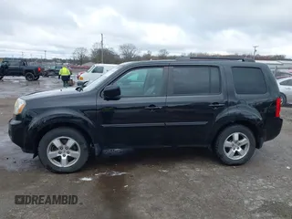 2011 Honda Pilot EX-L with VIN 5FNYF4H51BB080874, listed as a IAAI auction lot 42034400 with 194,080 mi miles and . Bid and sale history available at carsss.com. Image 14.