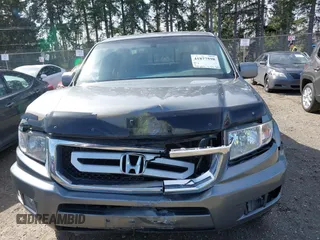 2009 Honda Ridgeline RTL with VIN 5FPYK16599B100707, listed as a IAAI auction lot 41877598 with 130,622 mi miles and . Bid and sale history available at DreamBid. Image 12.