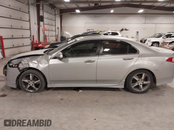 2012 Acura TSX Special Edition z VIN JH4CU2E88CC025368, wystawiony jako IAAI lot #41524028 z przebiegiem 135 434 mil mil oraz . Historia ofert i sprzedaży dostępna na DreamBid. Obrazek 14.