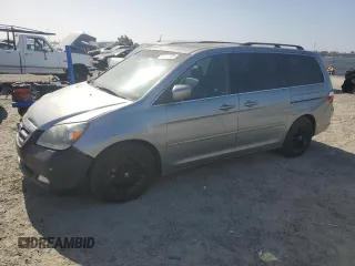 2007 Honda Odyssey Touring z VIN 5FNRL38867B115465, wystawiony jako Copart lot #59216205 z przebiegiem 155 787 mil mil oraz Czysty tytuł • Clean title. Historia ofert i sprzedaży dostępna na DreamBid. Obrazek 1.