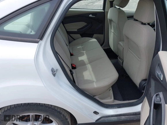 2016 Ford Focus SE with VIN 1FADP3F21GL403121, listed as a IAAI auction lot 42130743 with 103,592 mi miles and . Bid and sale history available at DreamBid. Image 8.