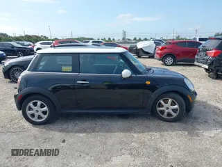 2010 MINI Hardtop with VIN WMWMF3C5XATU77265, listed as a IAAI auction lot 42007797 with 28,856 mi miles and . Bid and sale history available at DreamBid. Image 13.