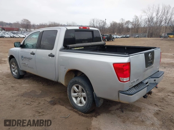 2012 Nissan Titan S with VIN 1N6AA0EJXCN310874, listed as a IAAI auction lot 42022787 with 162,317 mi miles. Bid and sale history available at carsss.com. Image 3.